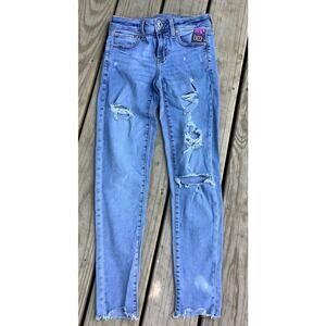 American Eagle Destroyed Jeggings Size 2 Next Level Stretch Ripped Raw Hem Blue